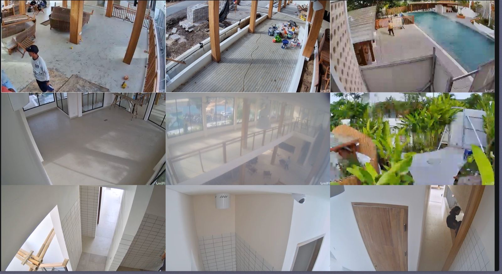 UniFi Protect nine-camera grid at Ants Pants on 7 January 2026 — the restaurant's cameras online before opening, watching paint buckets and workers on the unfinished pool deck