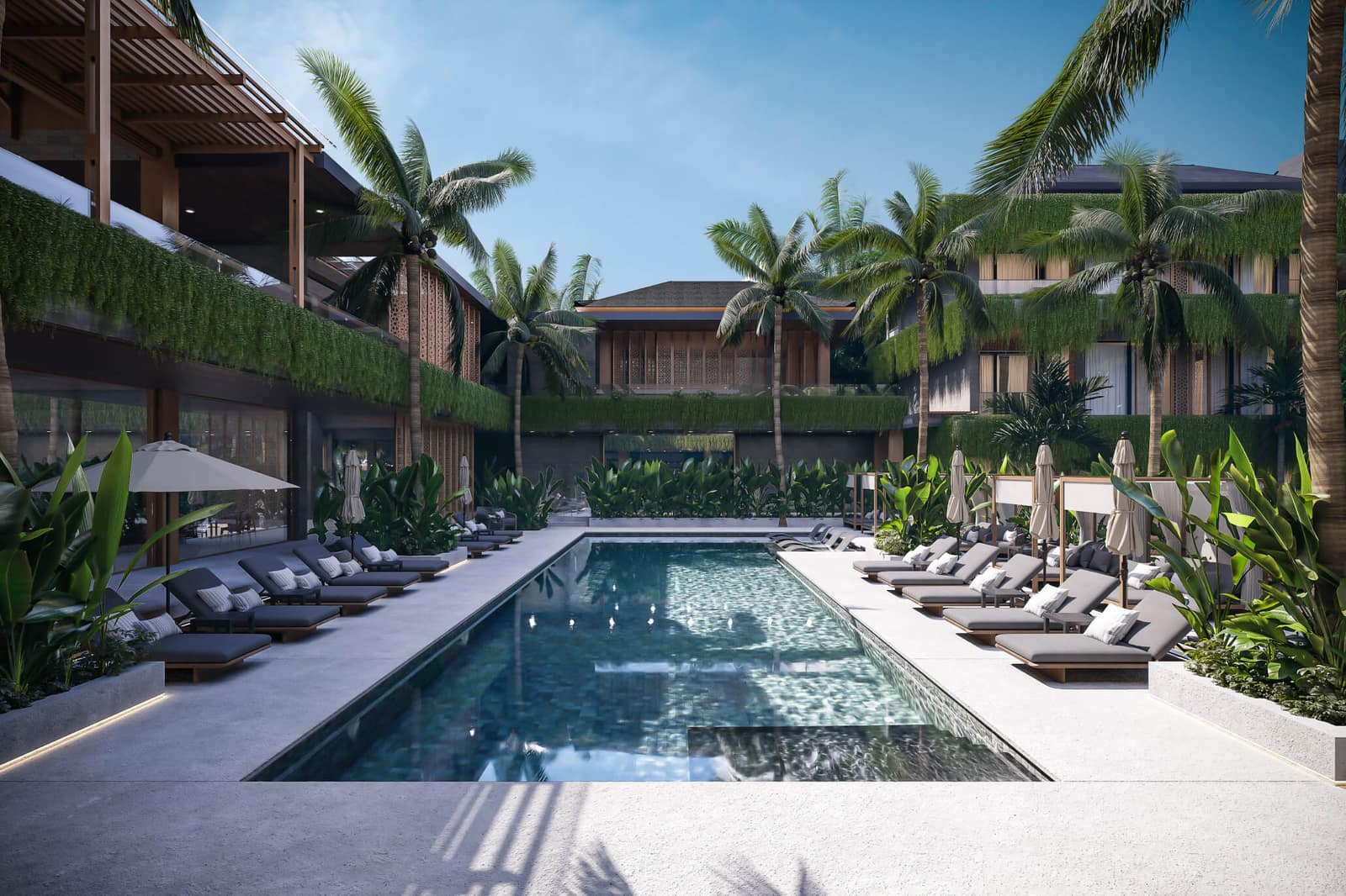Render of the main NOVO Ubud swimming pool flanked by loungers and palms, a central common space in the Ubud complex